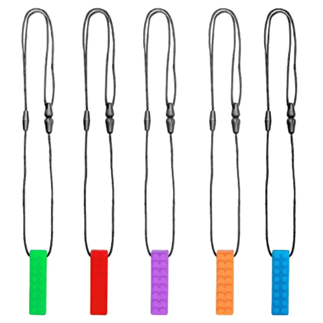 Silicone Sensory Necklace Sensory necklaces are great for kids ages 3+. Discreet and can be worn under tee-shirts at school, in times of stress, anxiety or restlessness our sensory necklaces are there to help. Our block pendant necklaces come fitted with a safety break away clasp like all our silicone jewellery. Blocks are currently available in Blue, Red, Yellow, Green, Orange and Turquoise. Easy adjustable length from child to adult.