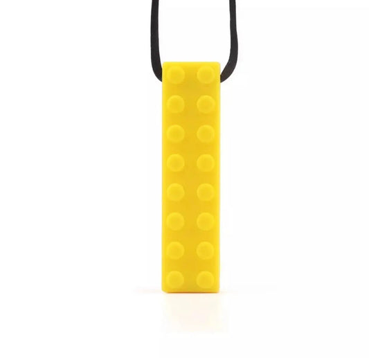 Silicone Sensory Necklace Sensory necklaces are great for kids ages 3+. Discreet and can be worn under tee-shirts at school, in times of stress, anxiety or restlessness our sensory necklaces are there to help. Our block pendant necklaces come fitted with a safety break away clasp like all our silicone jewellery. Blocks are currently available in Blue, Red, Yellow, Green, Orange and Turquoise. Easy adjustable length from child to adult.